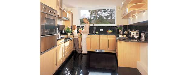 The Dimplex BFH range of plinth heaters fit neatly in the space beneath the kitchen cupboards