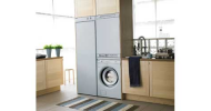 THE MAYTAG DRYING CABINET KEEPS LAUNDERED AND DAMP OUTDOOR CLOTHES IN ONE NEAT PLACE