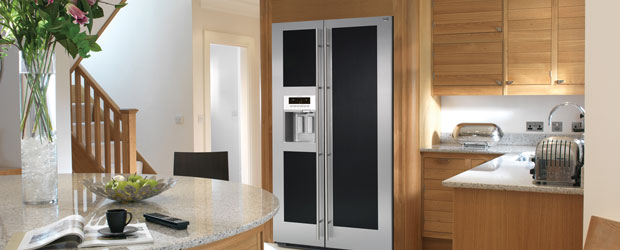 MAYTAG’S NEW BLACK AND STEEL SIDE- BY-SIDE REFRIGERATOR
